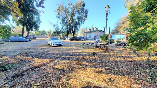a view of a street with a building in the background