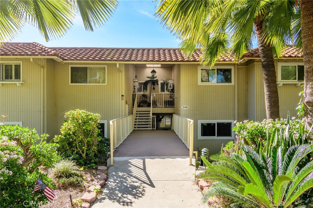 2139 Ronda Granada, Unit B Laguna Woods, CA 92637 - Photo 4 of 46 2139 Unit B Lower unit with 8 steps to door.