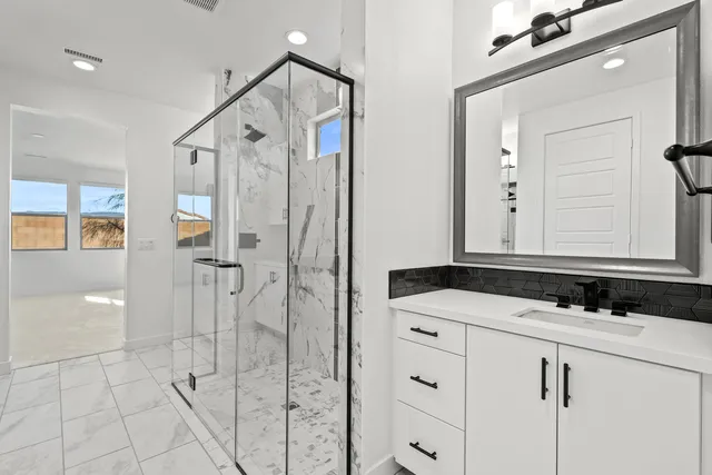 a view of a house with backyard and garden