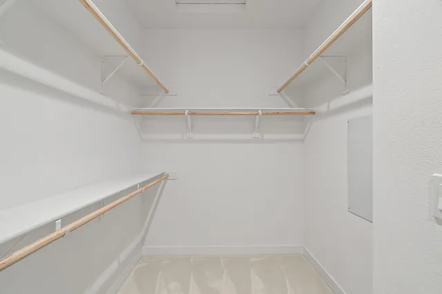 a house with a lot of flower plants