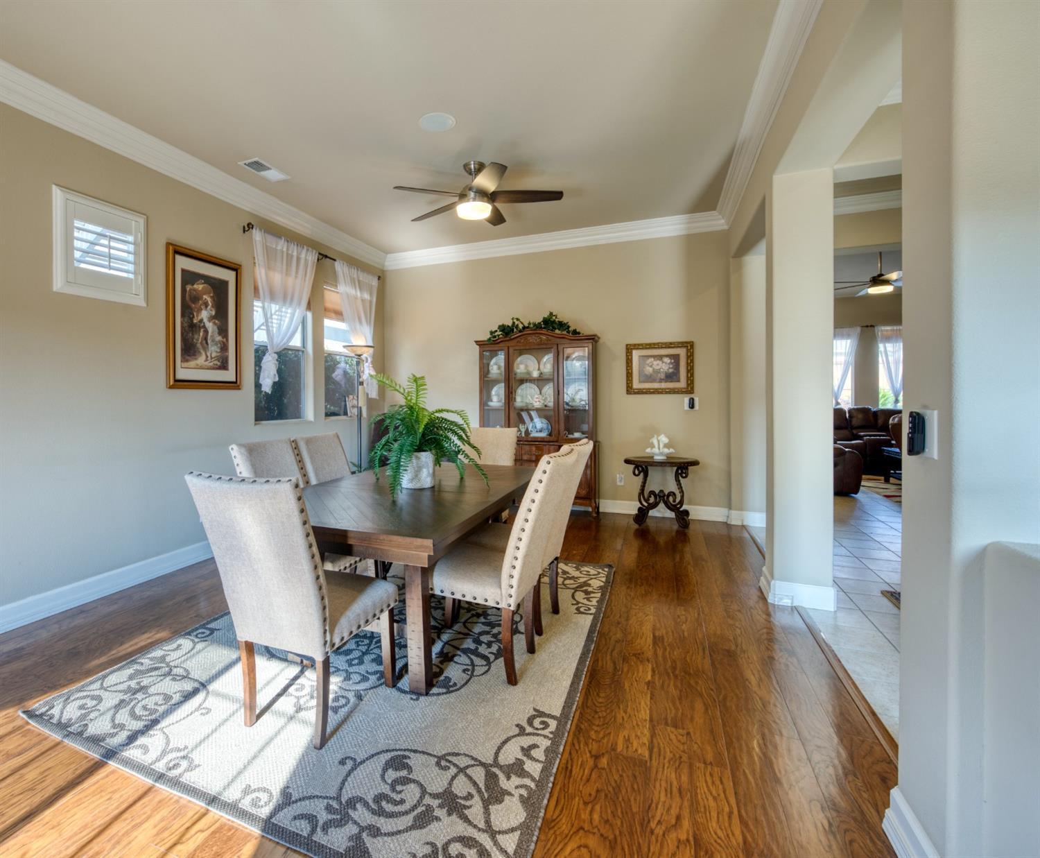 143 West Bedford Avenue Clovis, CA 93611 - Photo 12 of 55 a view of a dining room with furniture