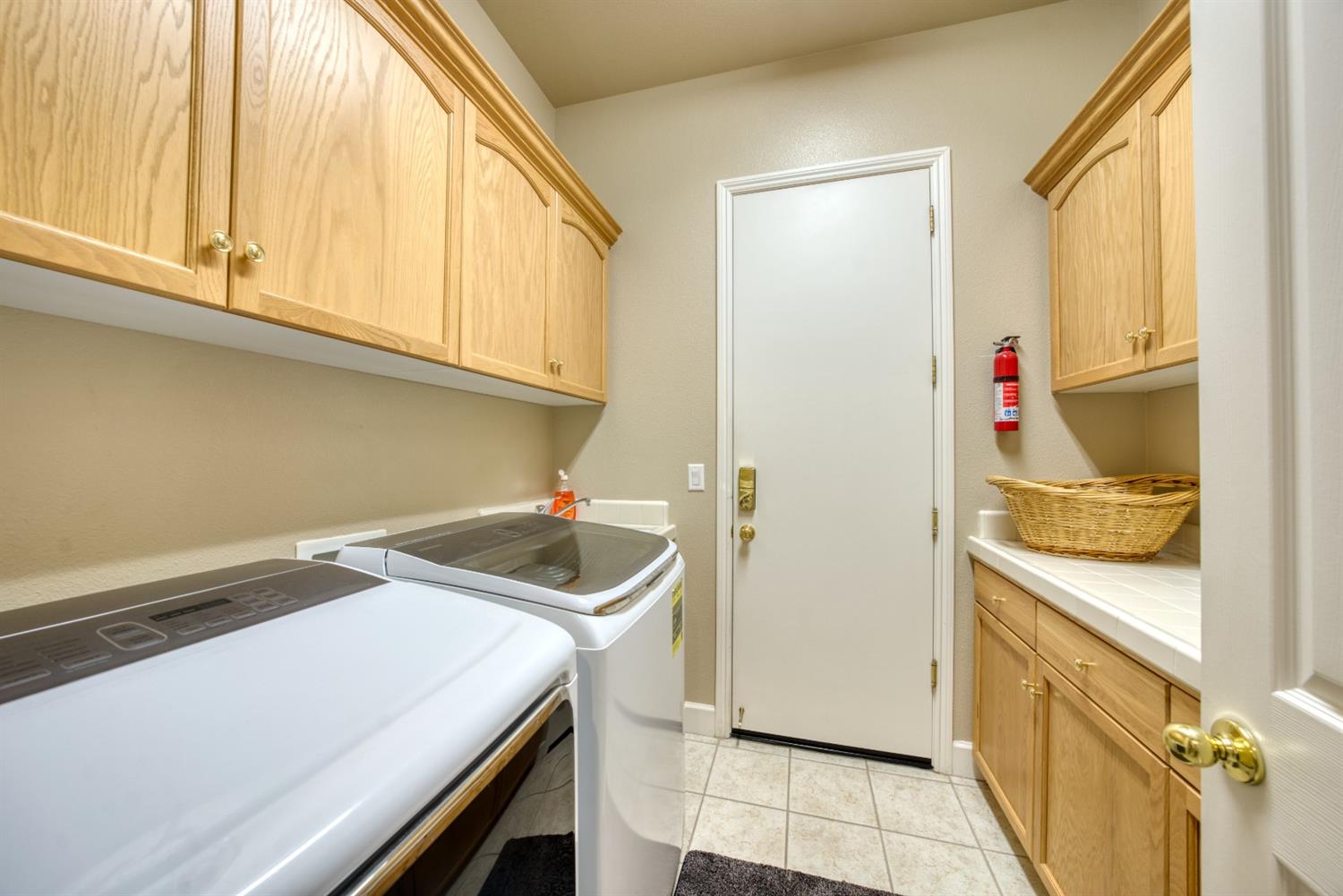 143 West Bedford Avenue Clovis, CA 93611 - Photo 38 of 55 a room with storage and utility