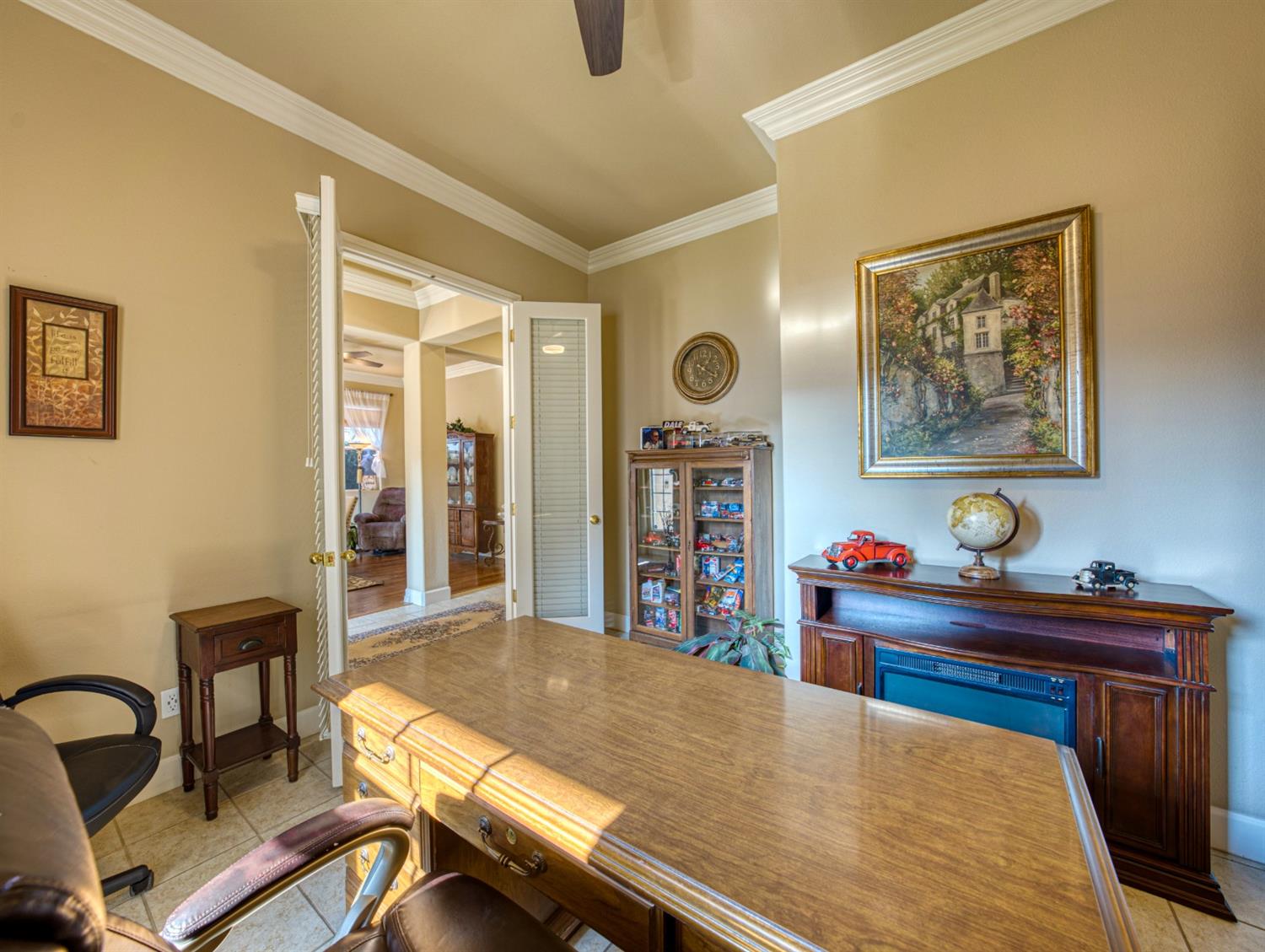 143 West Bedford Avenue Clovis, CA 93611 - Photo 43 of 55 a living room with furniture and a table