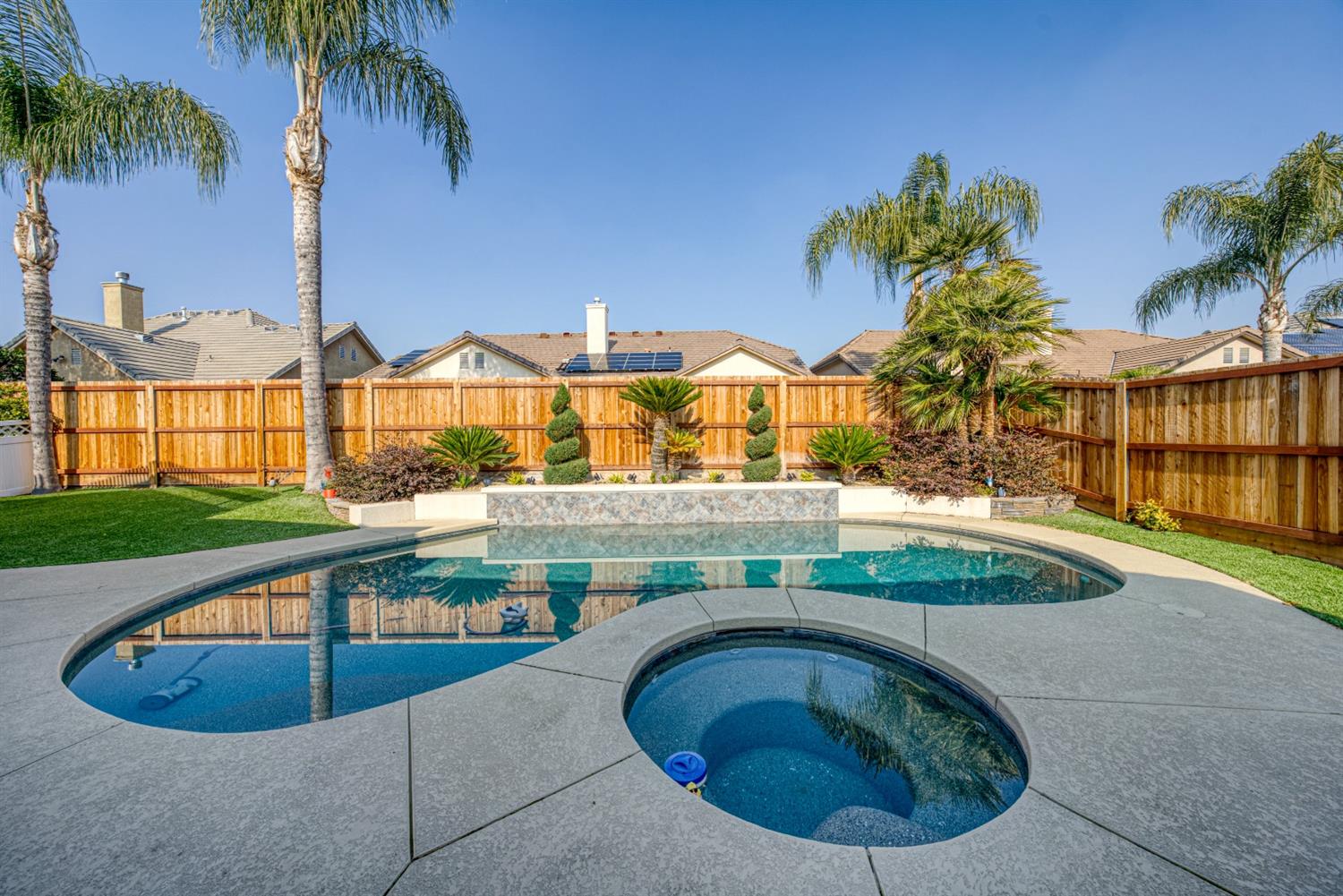143 West Bedford Avenue Clovis, CA 93611 - Photo 50 of 55 a view of swimming pool and lake view