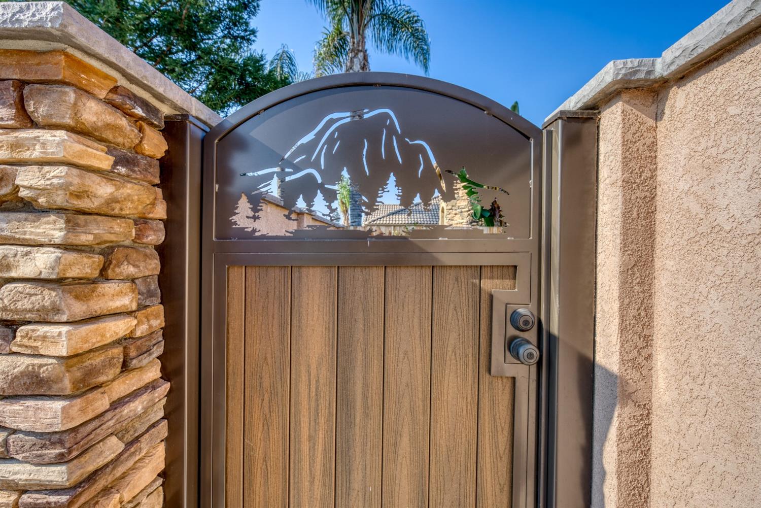 143 West Bedford Avenue Clovis, CA 93611 - Photo 5 of 55 a view of a door of a house with a small yard