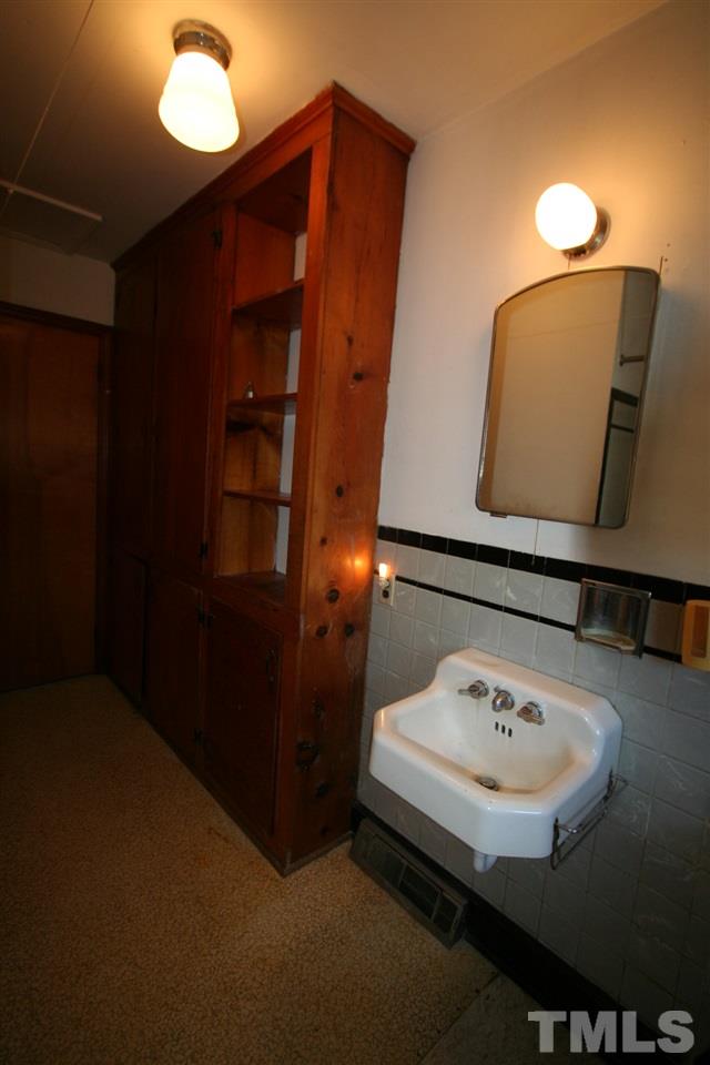 2910 Shady Grove Road Durham, NC 27703 - Photo 16 of 25 Lots of storage in bathroom