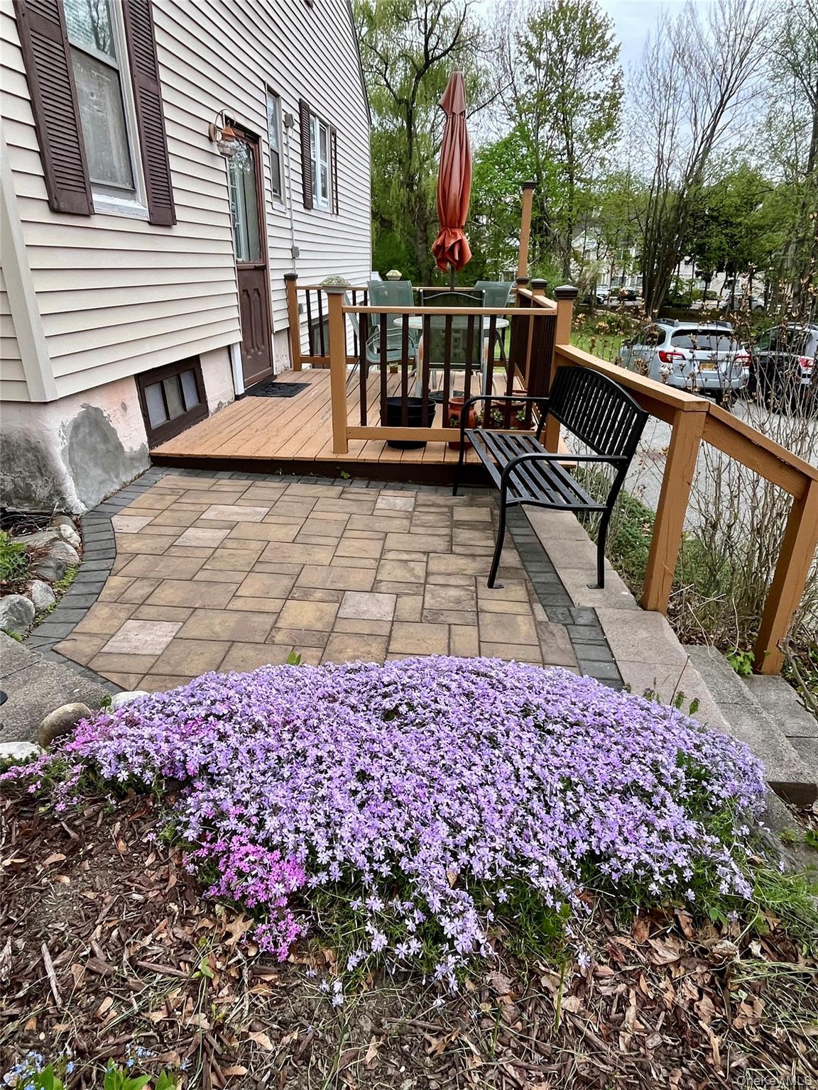 35 Spring Street Goshen, NY 10924 - Photo 24 of 26 a view of a bench in back yard
