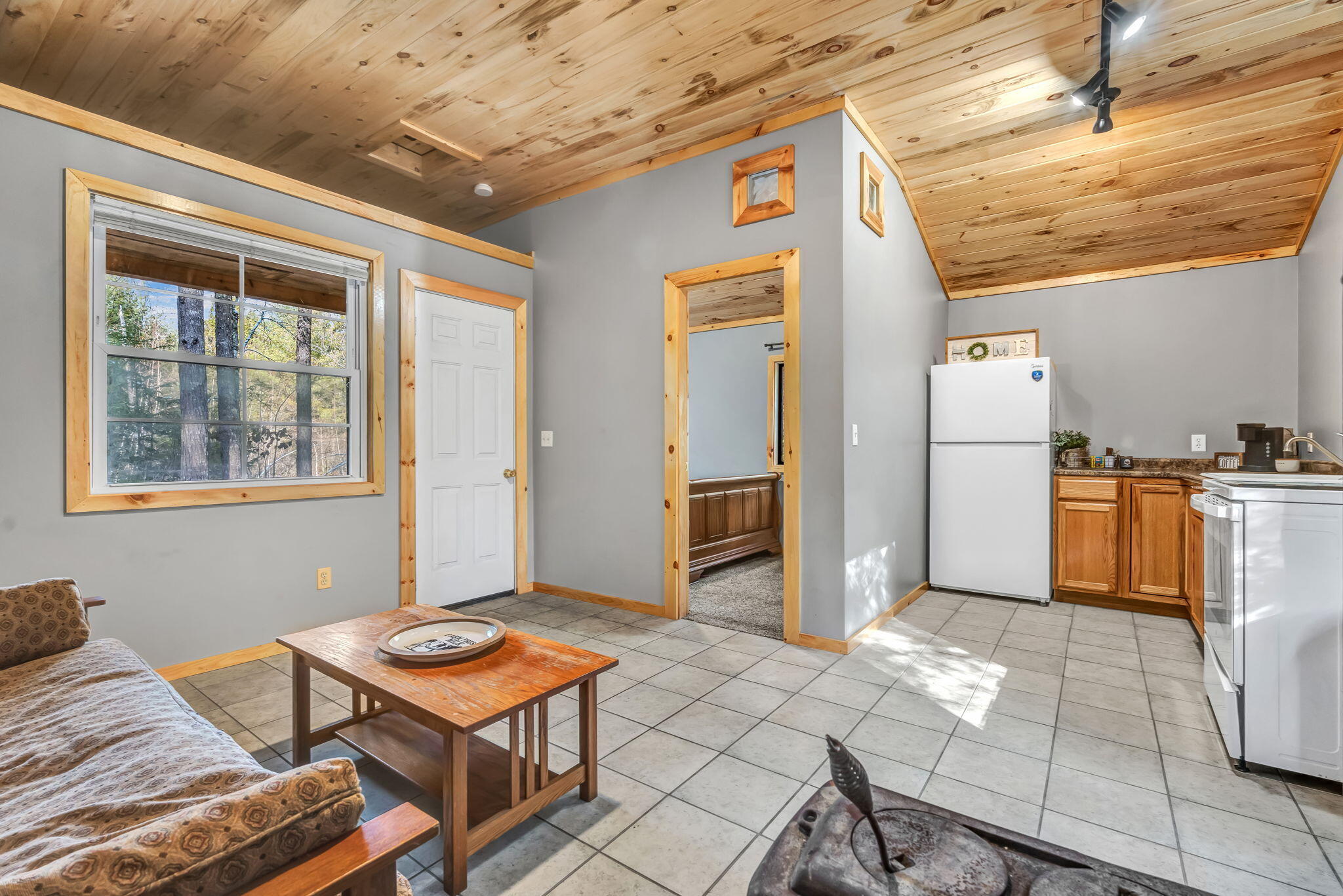 210 Pleasant Street Passadumkeag, ME 04475 - Photo 5 of 17 Inside from wood stove