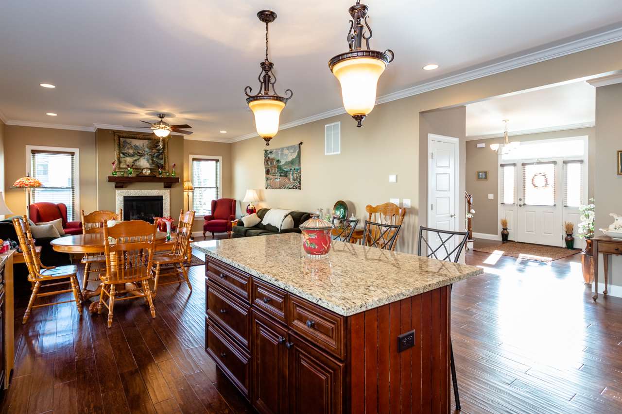 3880 Bull Run Road Penn Laird, VA 22846 - Photo 6 of 50 a view of a dining room and livingroom with furniture wooden floor a chandelier