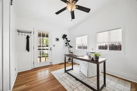 a work room with furniture and window