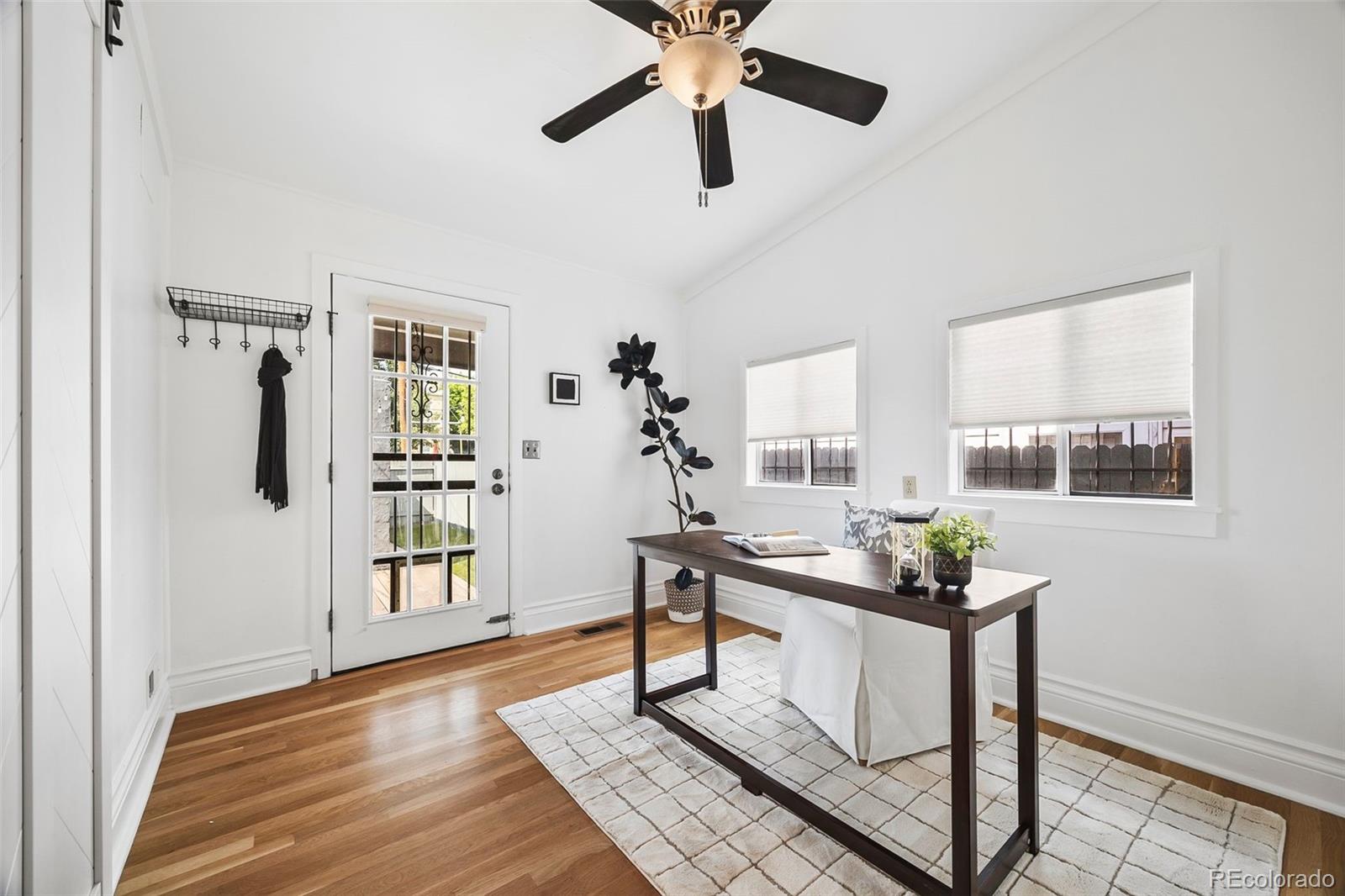 35 West Byers Place Denver, CO 80223 - Photo 13 of 31 a work room with furniture and window