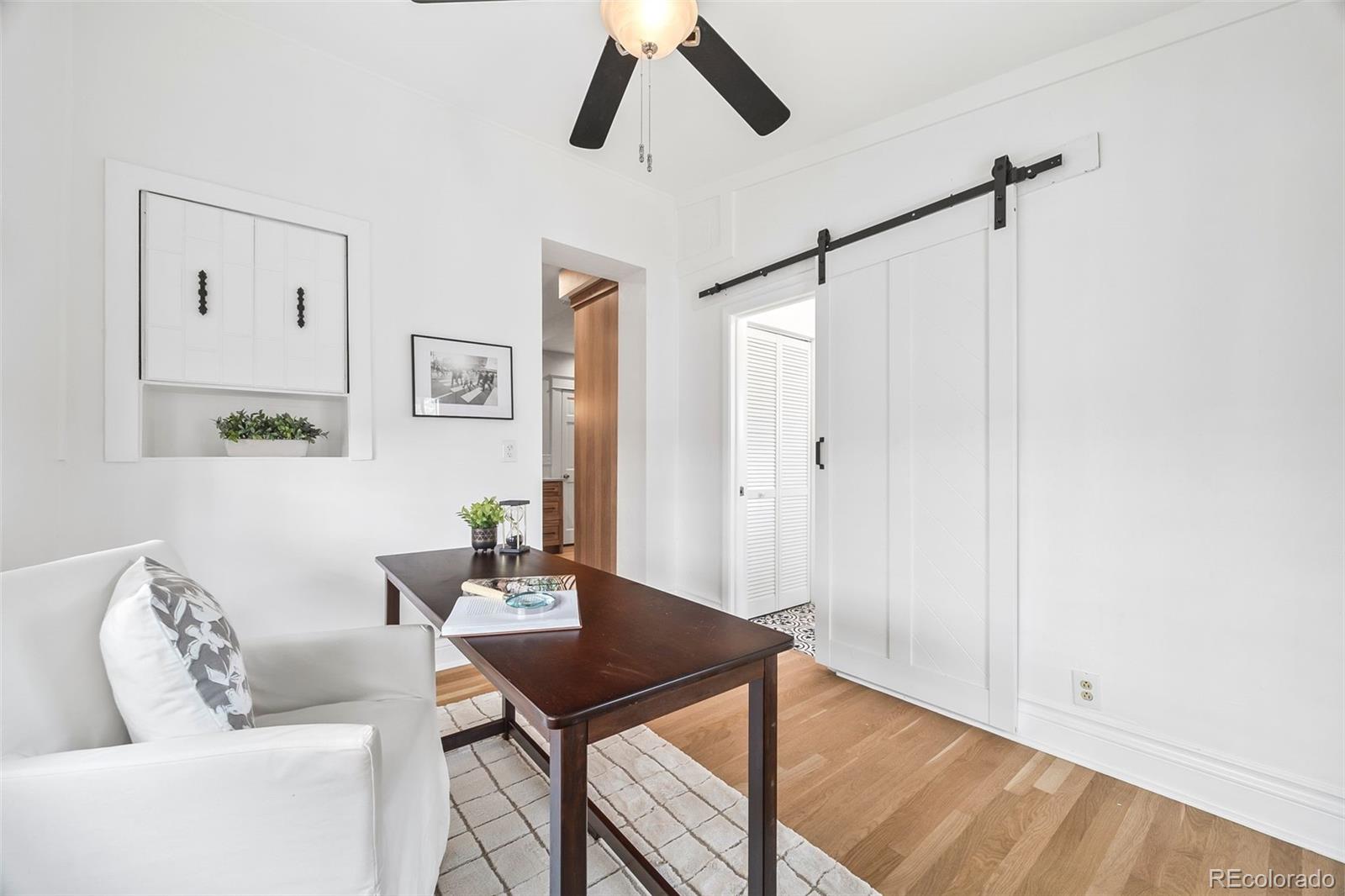 35 West Byers Place Denver, CO 80223 - Photo 14 of 31 a living room with furniture and a table