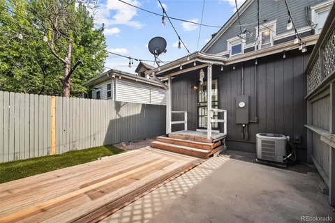 a backyard of a house with seating space