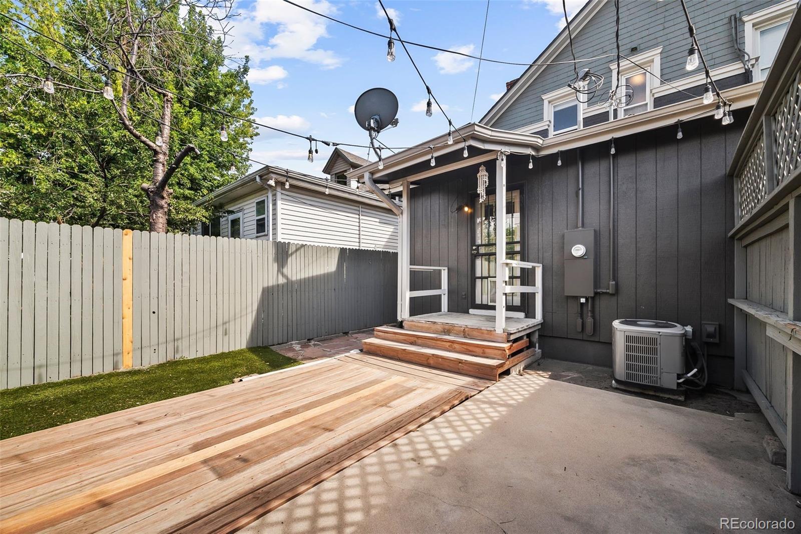 35 West Byers Place Denver, CO 80223 - Photo 24 of 31 a backyard of a house with seating space