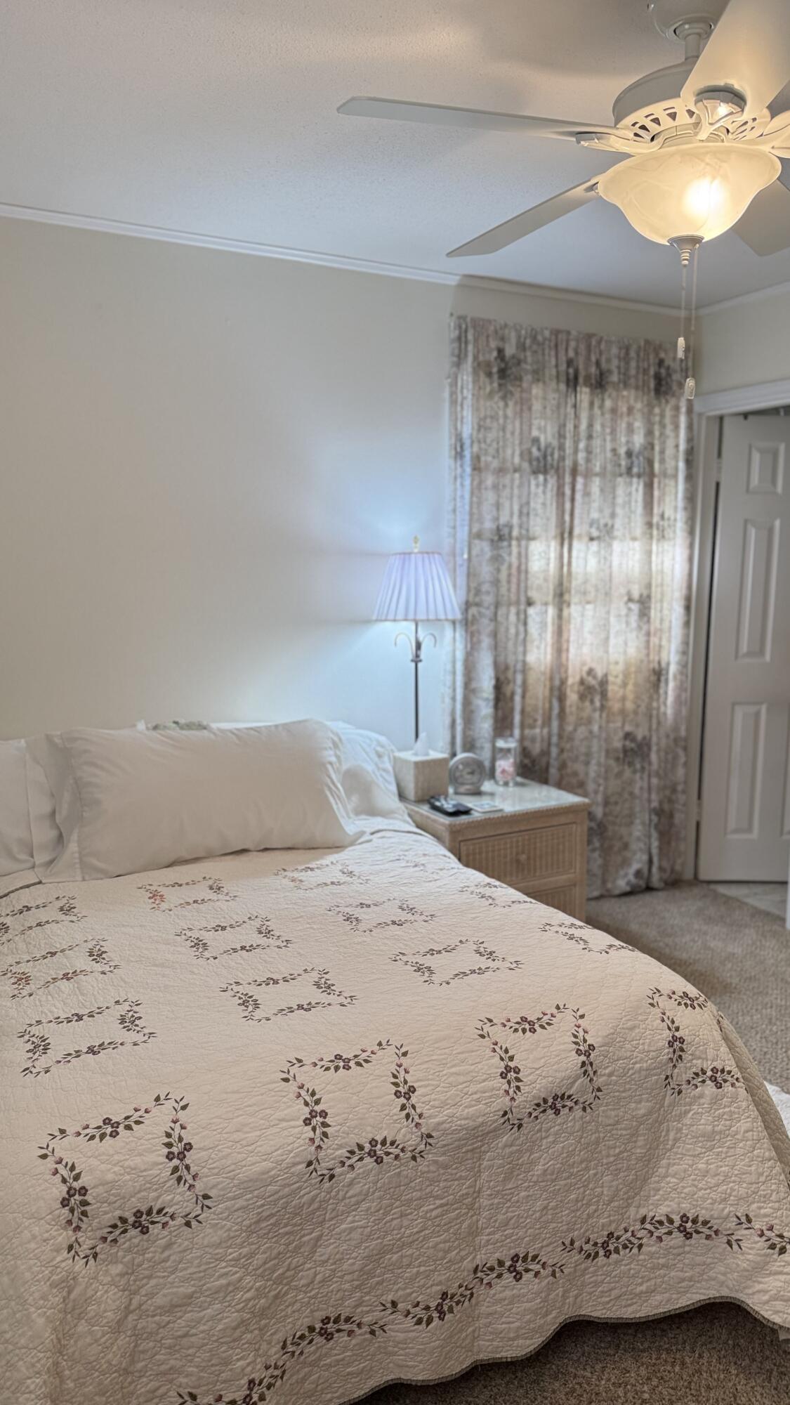 238 Martisa Road Northwest Fort Walton Beach, FL 32548 - Photo 13 of 48 a bedroom with a bed and a window