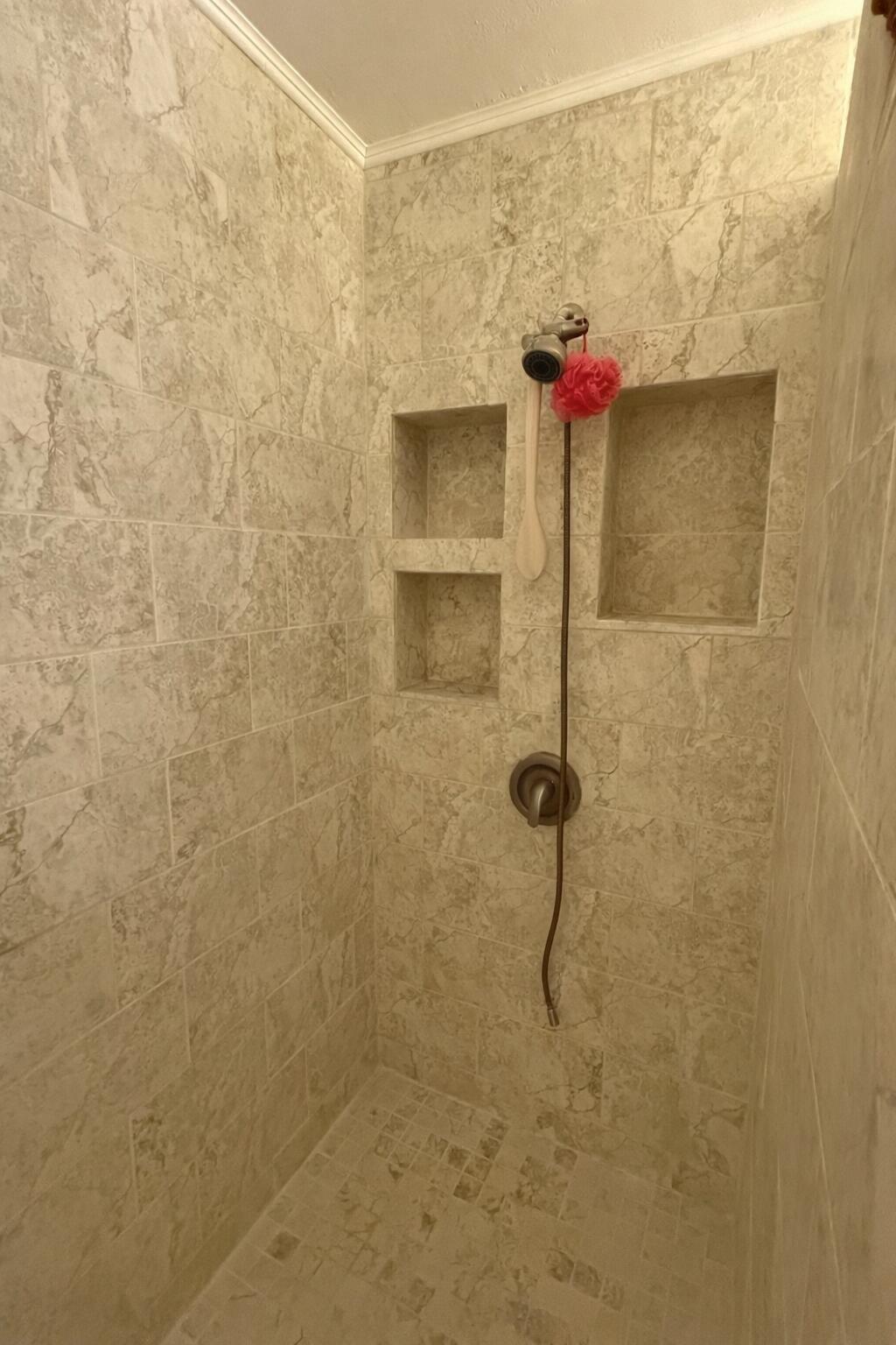 238 Martisa Road Northwest Fort Walton Beach, FL 32548 - Photo 17 of 48 a bathroom with a shower