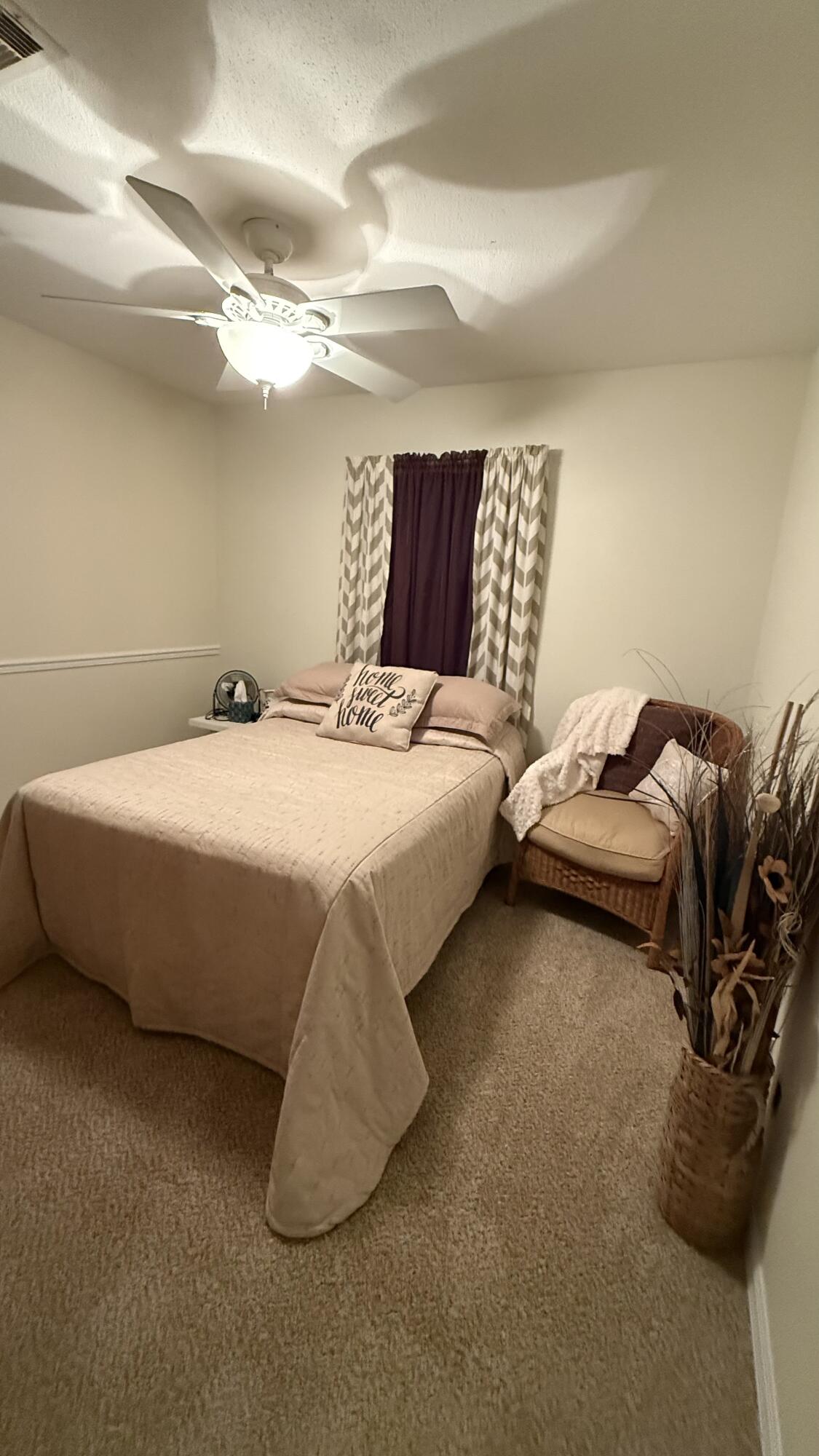 238 Martisa Road Northwest Fort Walton Beach, FL 32548 - Photo 19 of 48 a bedroom with a bed and a couch