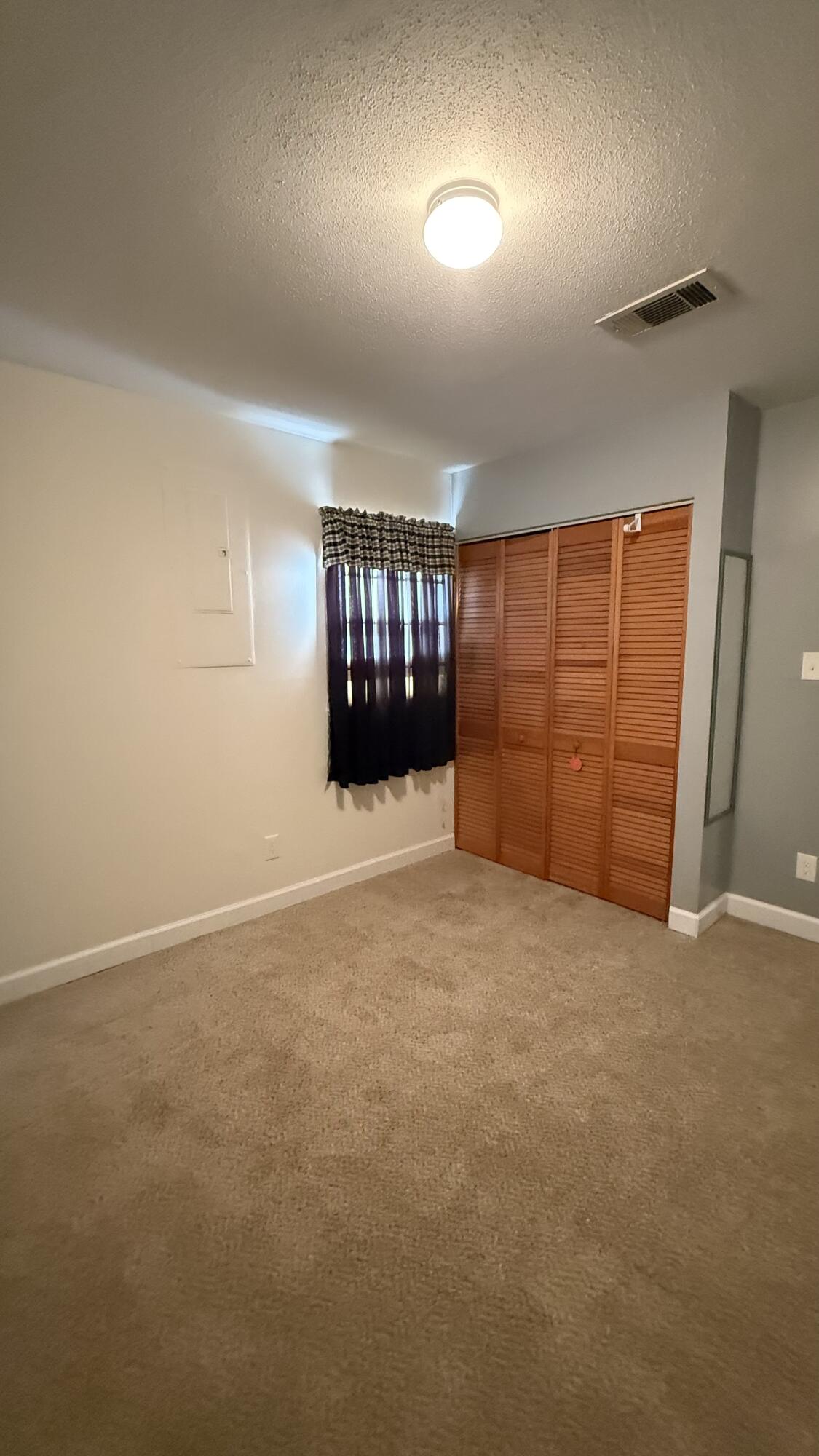 238 Martisa Road Northwest Fort Walton Beach, FL 32548 - Photo 24 of 48 an empty room with a empty space and windows