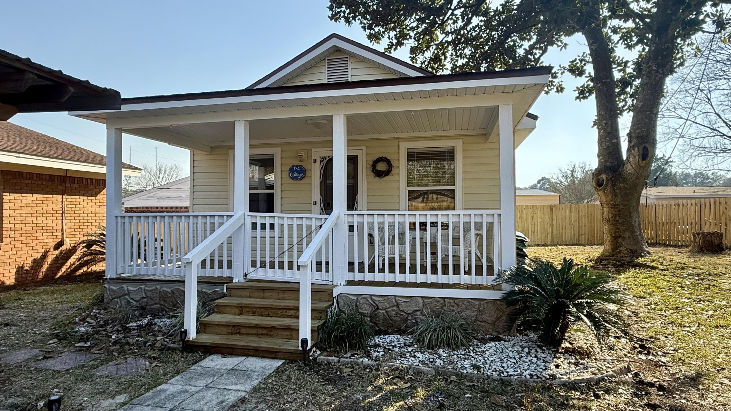 238 Martisa Road Northwest Fort Walton Beach, FL 32548 - Photo 35 of 48 a view of a house with a yard
