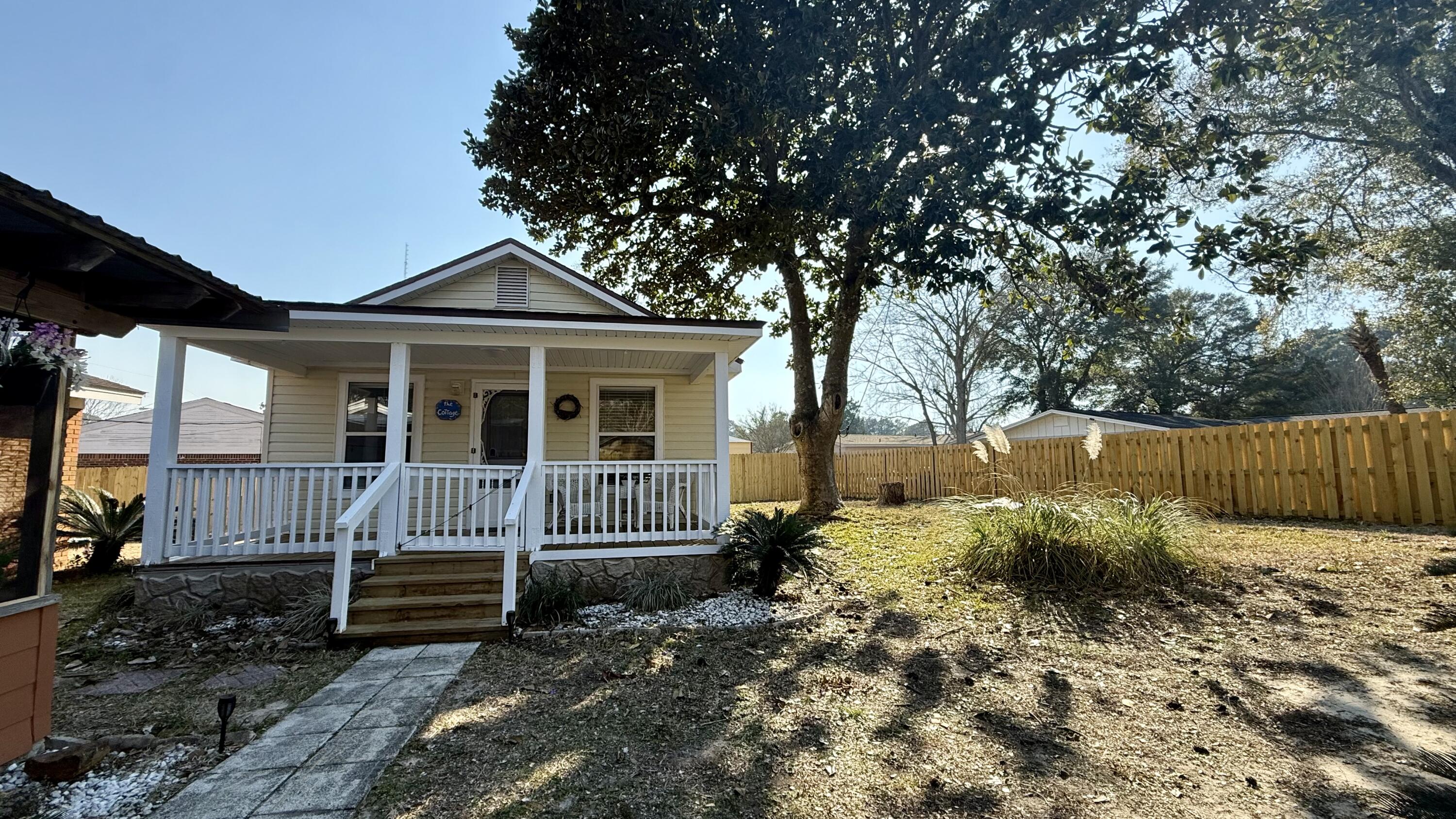 238 Martisa Road Northwest Fort Walton Beach, FL 32548 - Photo 37 of 48 a front view of a house with garden
