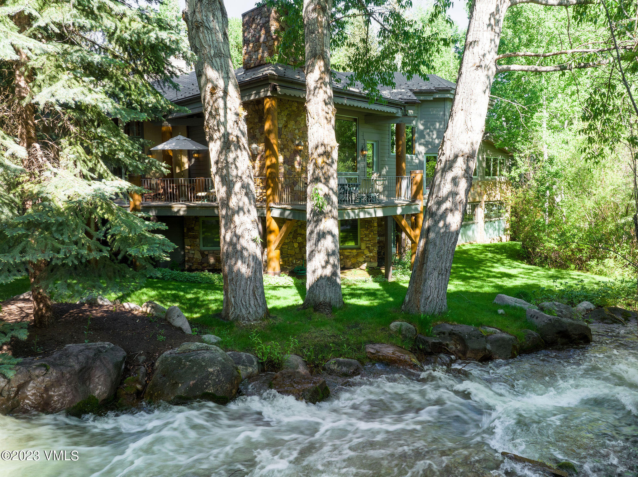 315 Mill Creek Circle Vail, CO 81657 - Photo 3 of 47 315_mill_creek_summer_aerial_f