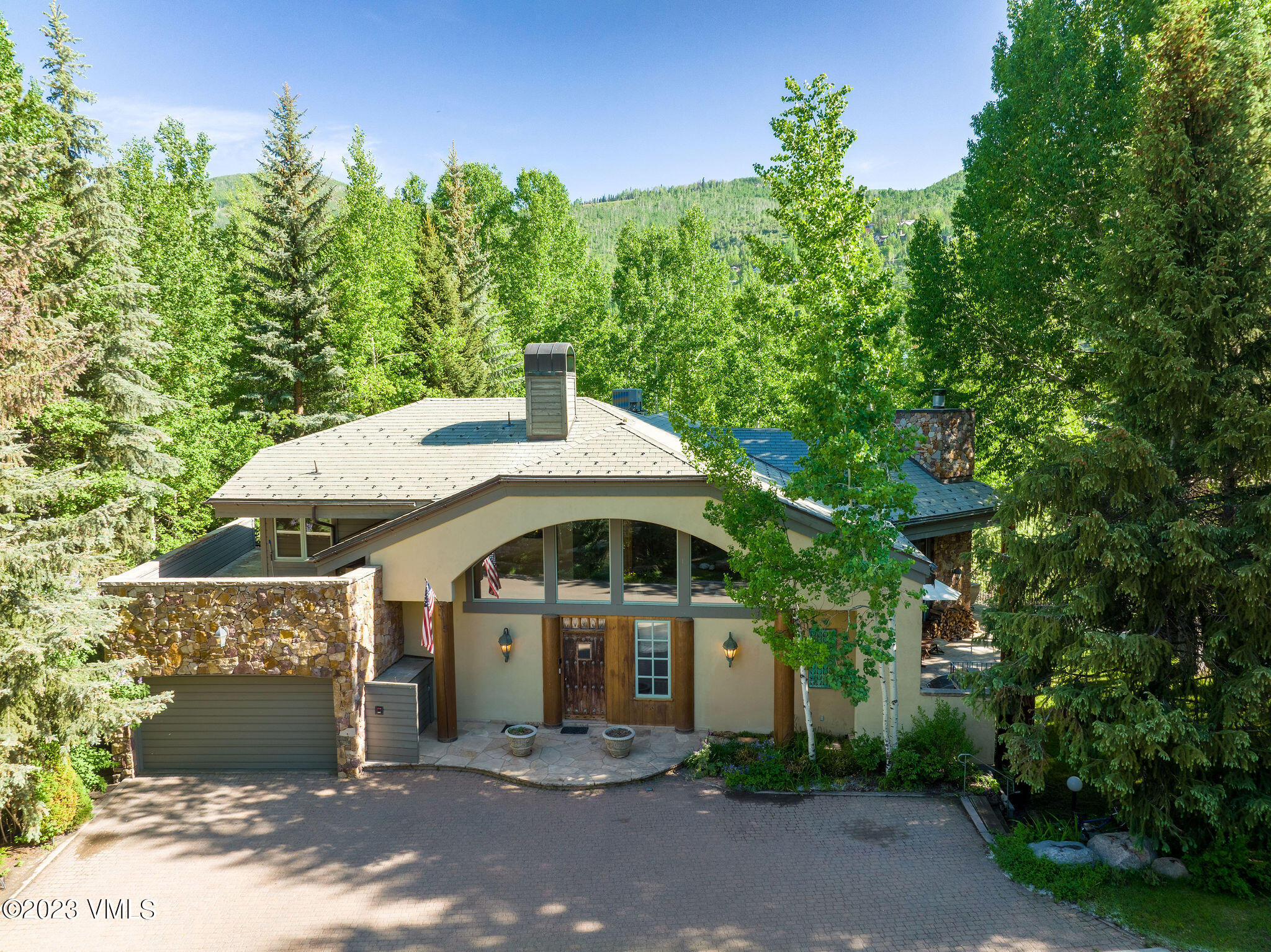 315 Mill Creek Circle Vail, CO 81657 - Photo 7 of 47 315_mill_creek_summer_aerial_a