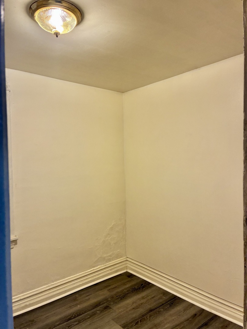 1706 North Springfield Avenue, Unit G Chicago, IL 60647 - Photo 4 of 8 a view of small space with wooden floor