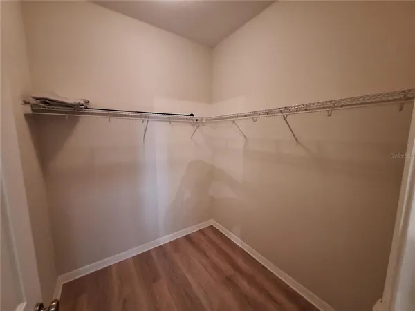 a view of a room with racks on the wall