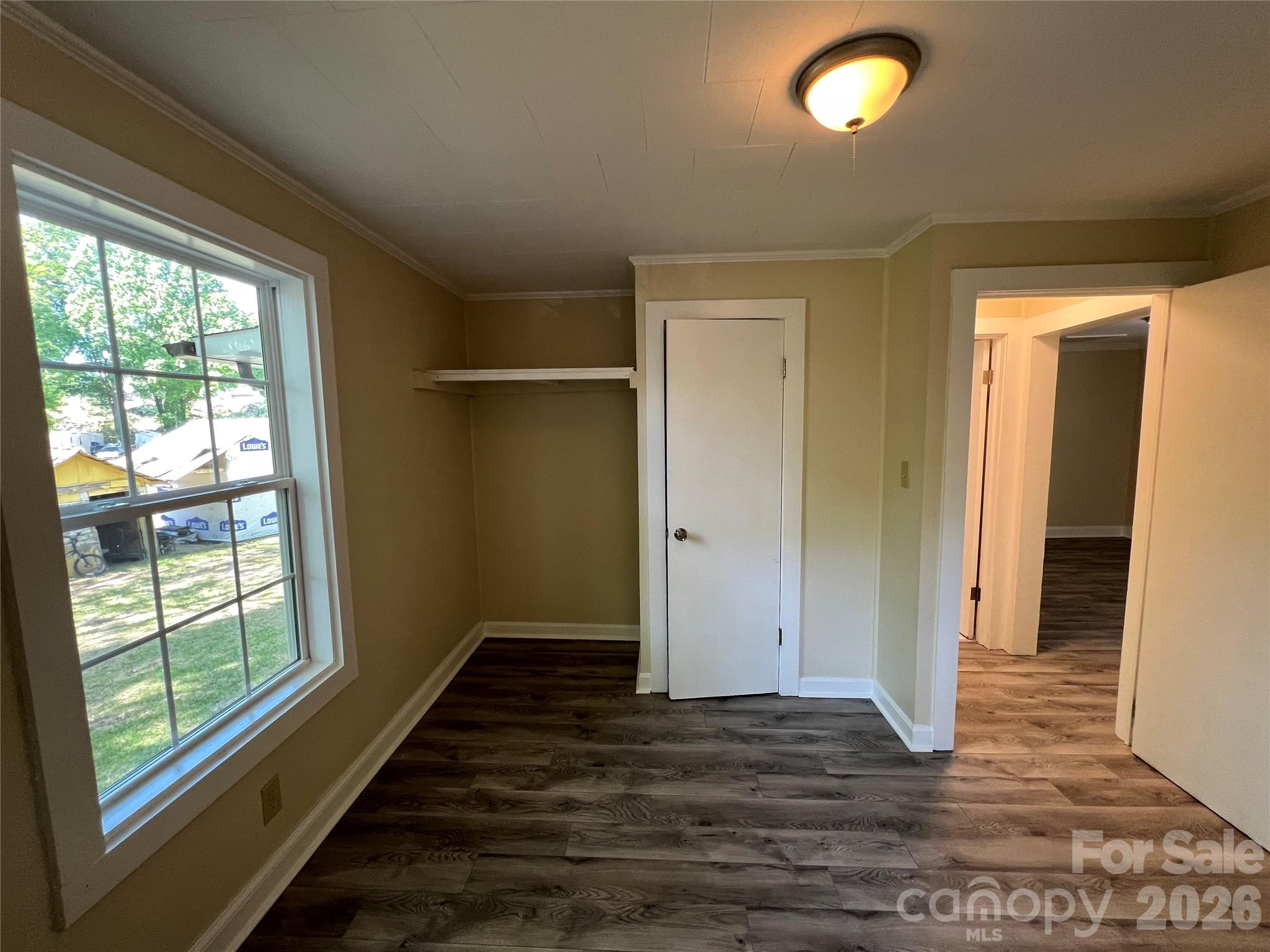 511 Murphy Street Kannapolis, NC 28081 - Photo 20 of 23 an empty room with wooden floor and windows
