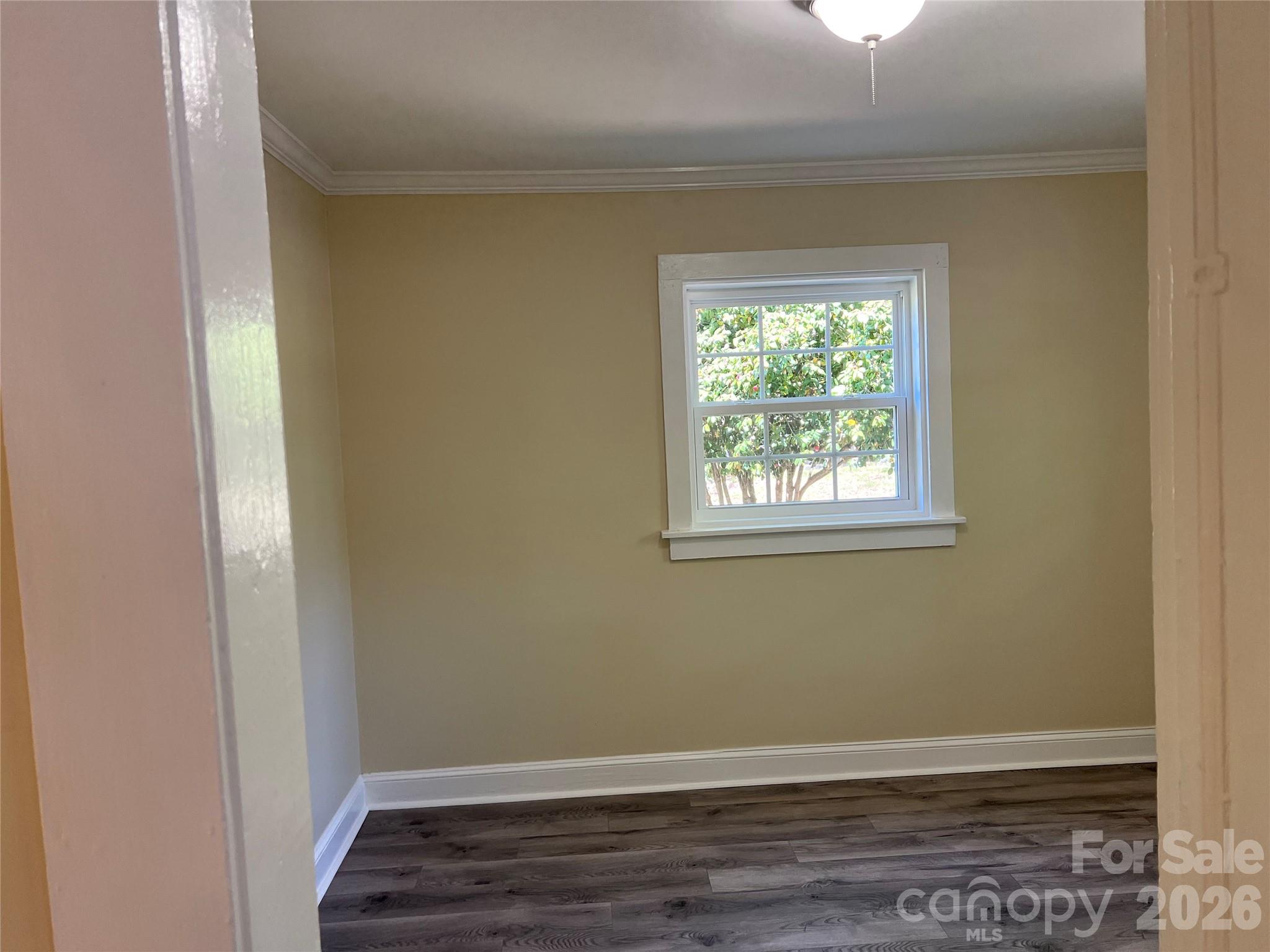 511 Murphy Street Kannapolis, NC 28081 - Photo 23 of 23 a view of room with window and hardwood floor