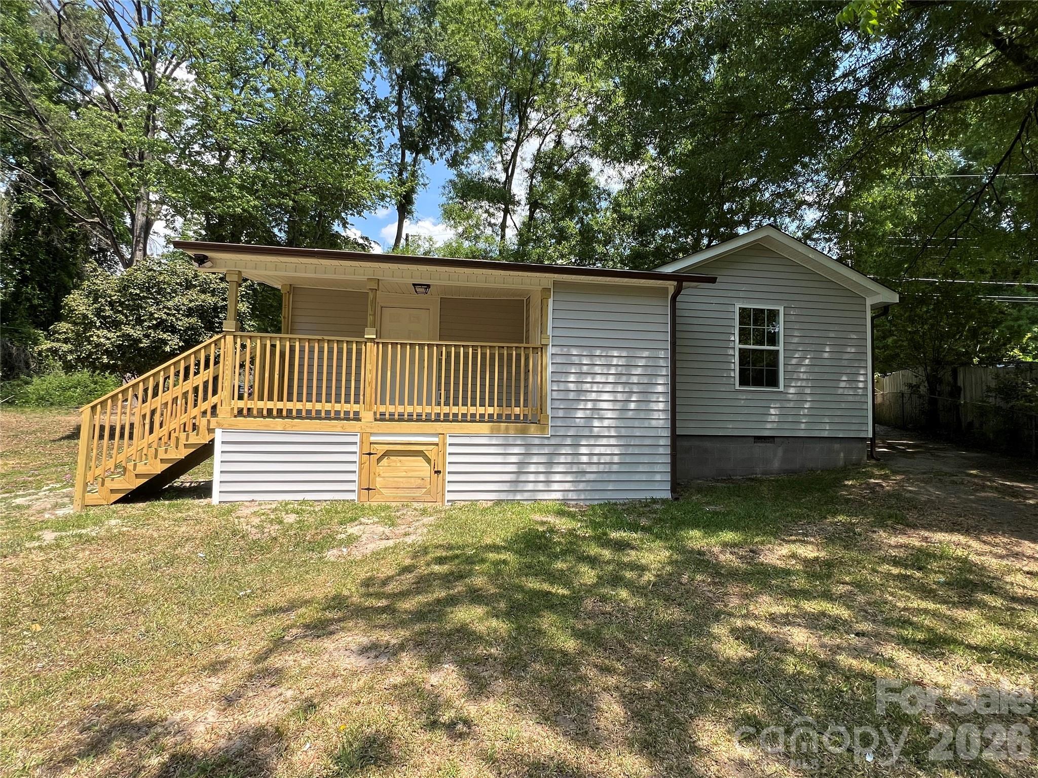 511 Murphy Street Kannapolis, NC 28081 - Photo 8 of 23 a house with trees in the background