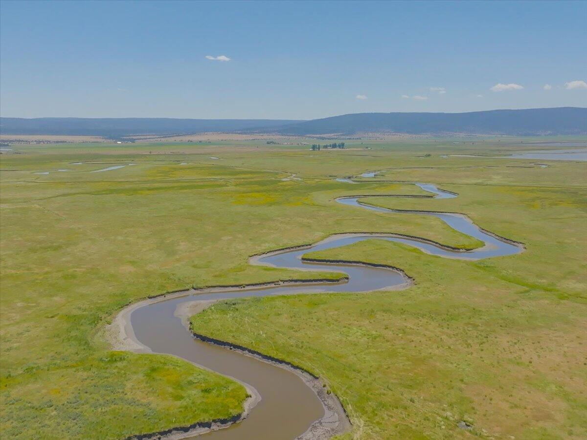 0 Punkin Center Road Bieber, CA 96009 - Photo 37 of 56 a view of a swimming pool with an outdoor space and seating area