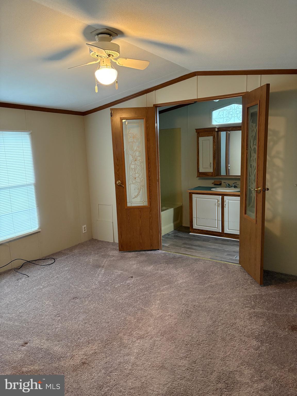 1021 Barberry Avenue, Unit T67 Reading, PA 19605 - Photo 7 of 10 an empty room with windows and closet