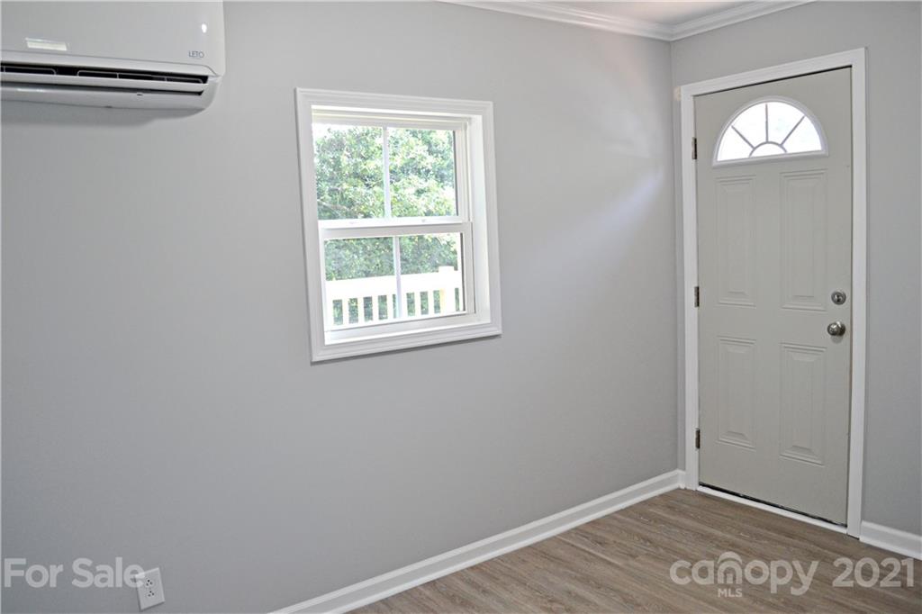 6814 Jenkins Road Morganton, NC 28655 - Photo 10 of 14 an empty room with windows