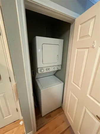 a utility room with washing machine