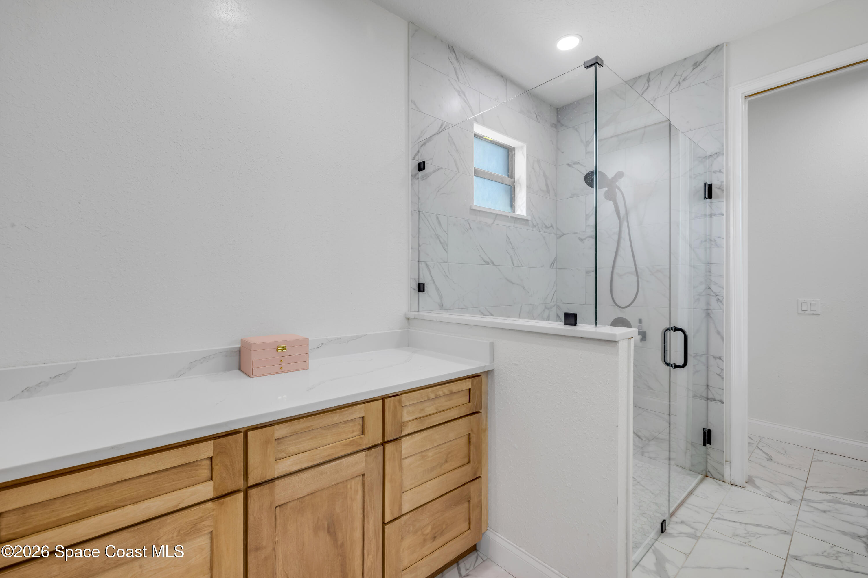 3395 Dunn Road Mims, FL 32754 - Photo 22 of 40 a bathroom with a granite countertop sink and shower