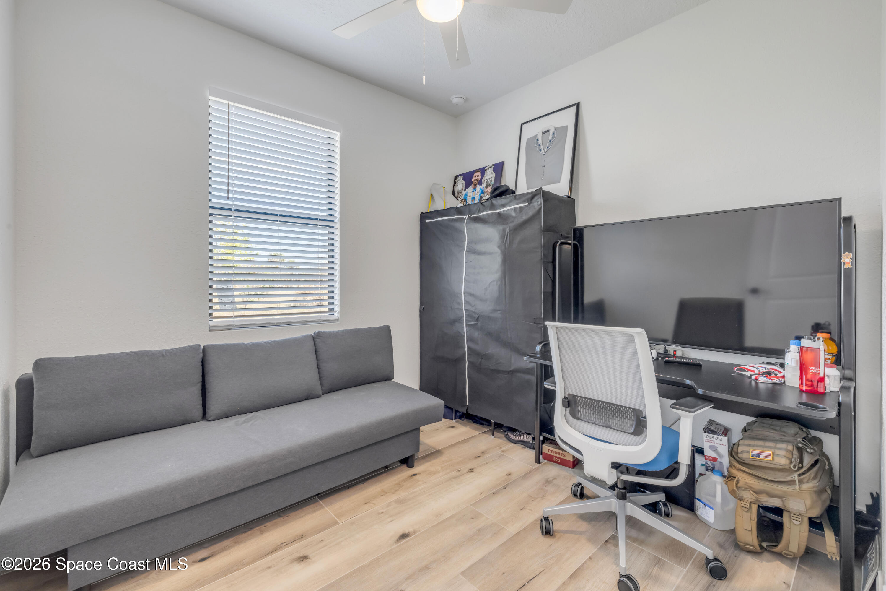 3395 Dunn Road Mims, FL 32754 - Photo 26 of 40 a living room with furniture and a wooden floor