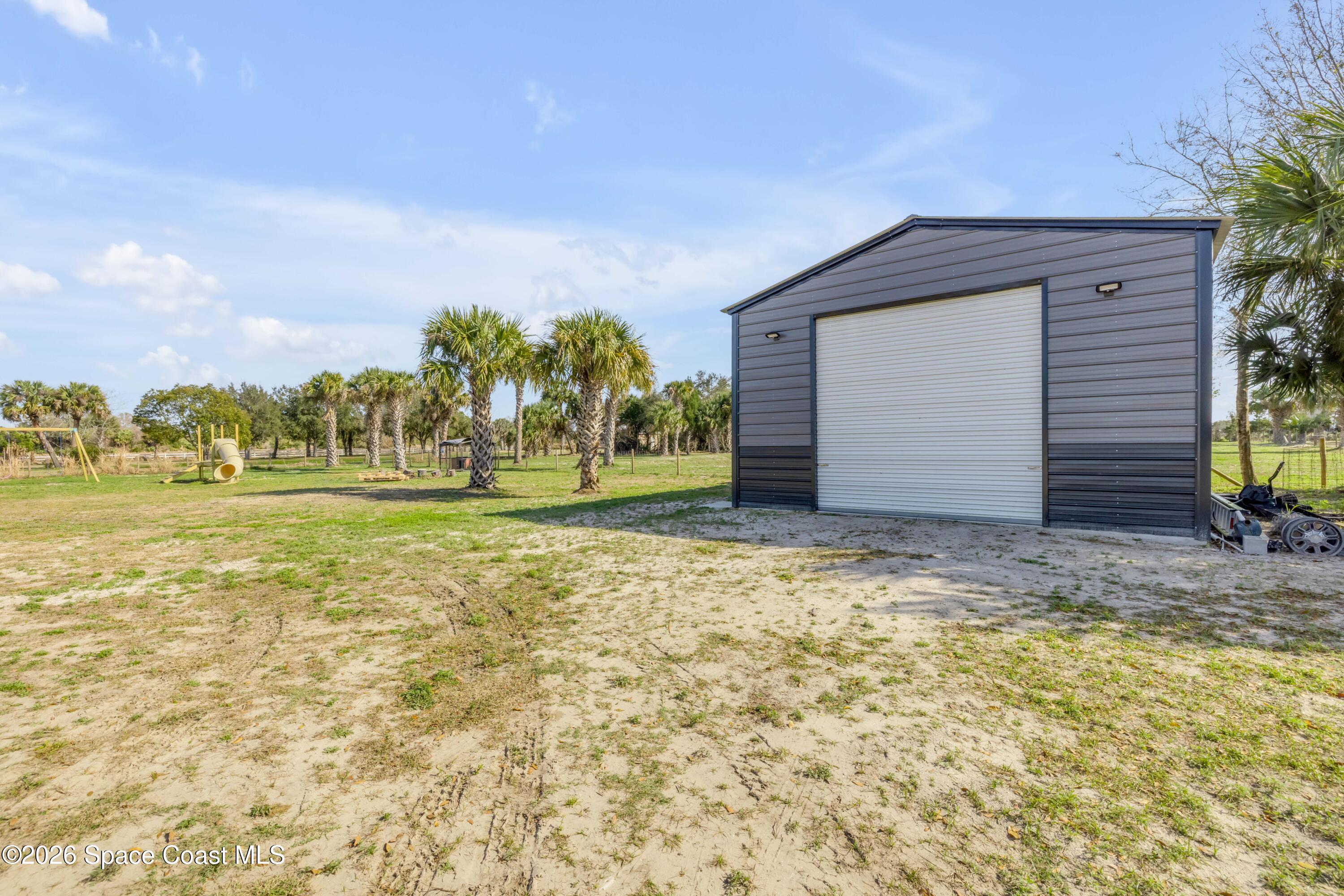 3395 Dunn Road Mims, FL 32754 - Photo 36 of 40 a view of a garage