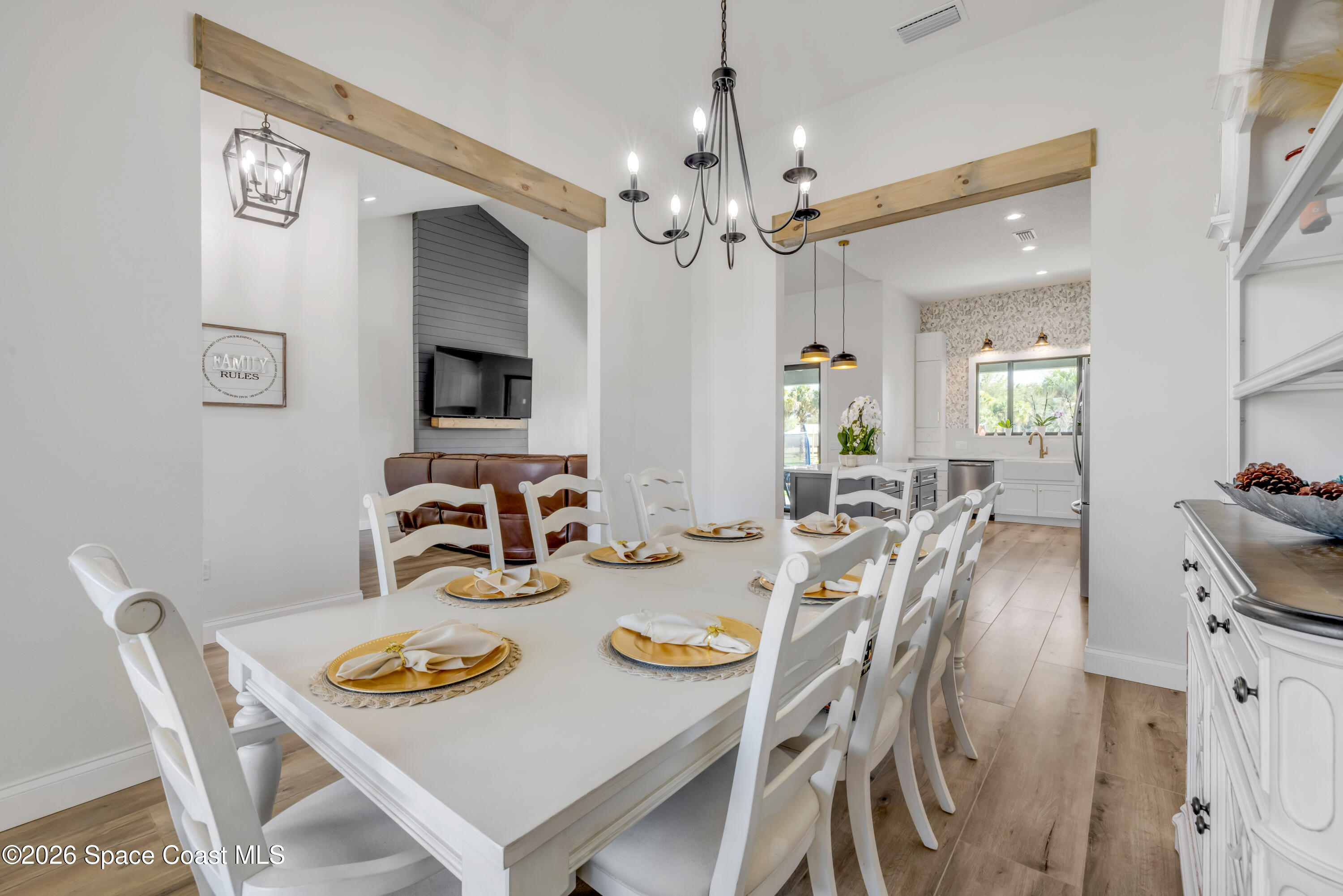 3395 Dunn Road Mims, FL 32754 - Photo 8 of 40 a view of a dining room with furniture and chandelier