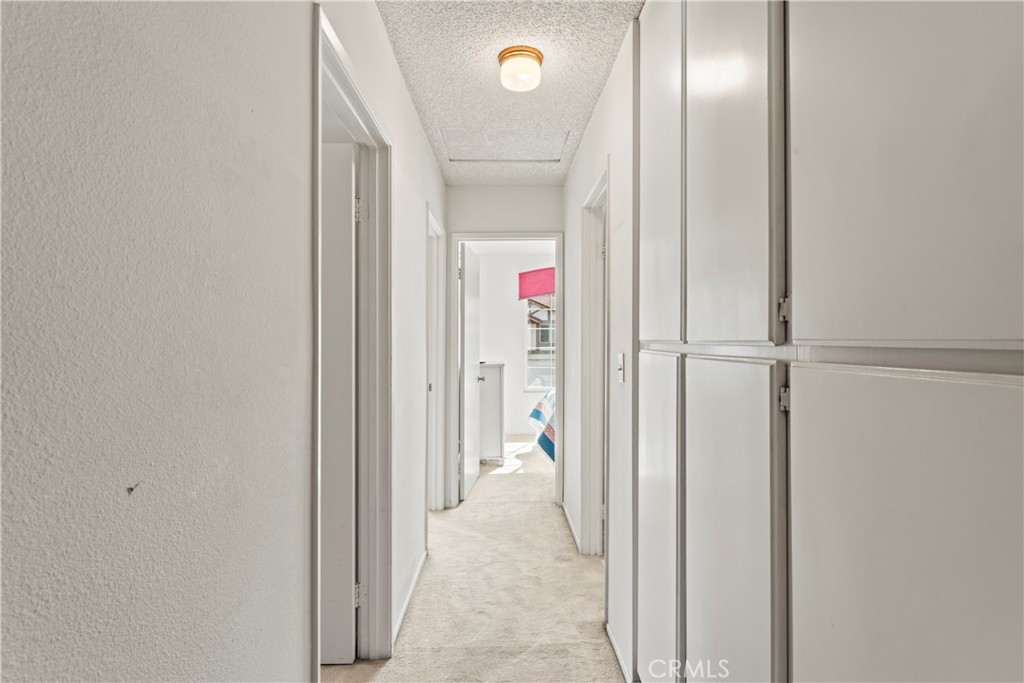 1749 Parkview Redlands, CA 92374 - Photo 35 of 55 a view of a hallway with wooden floor