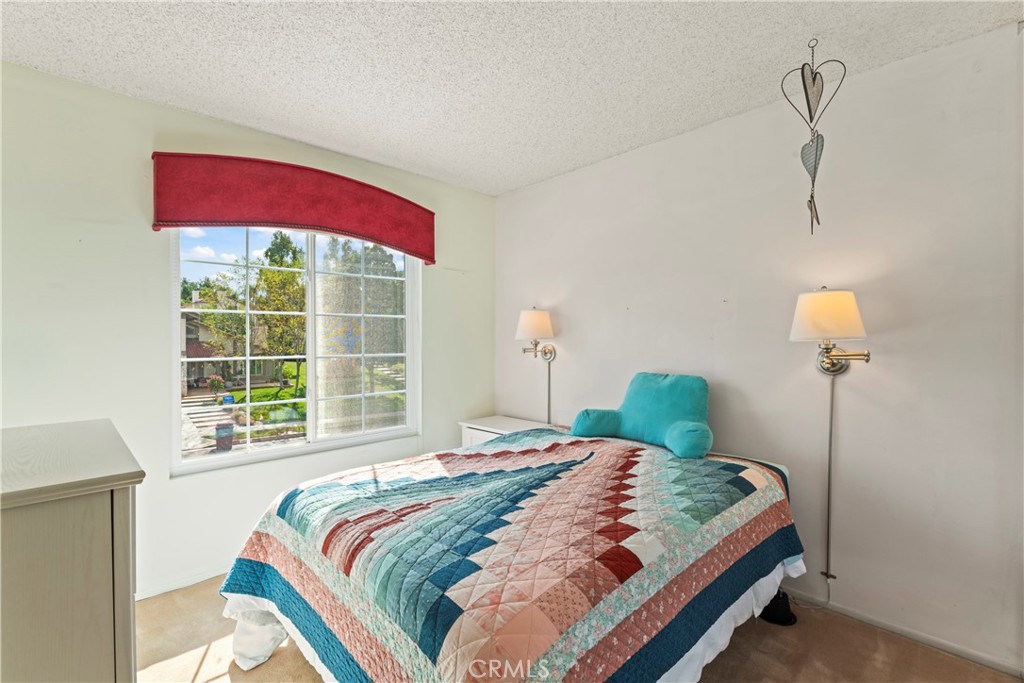 1749 Parkview Redlands, CA 92374 - Photo 36 of 55 a bedroom with a bed and window