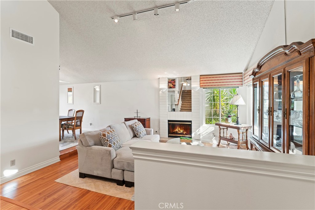 1749 Parkview Redlands, CA 92374 - Photo 7 of 55 a living room with furniture and a fireplace