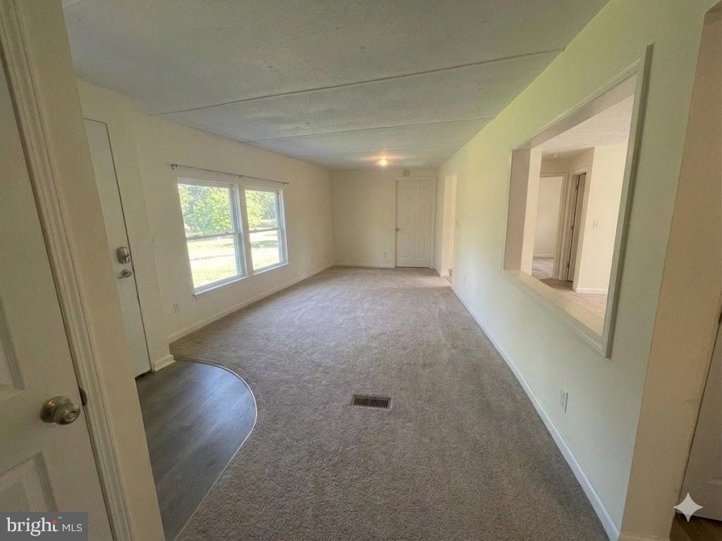 172 Rogers Mill Road Strasburg, VA 22657 - Photo 19 of 23 a view of an empty room and a window