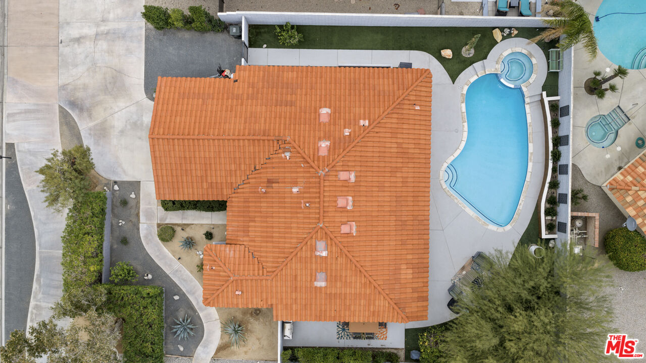 1450 East Racquet Club Road Palm Springs, CA 92262 - Photo 26 of 31 an aerial view of a house with a yard and plants