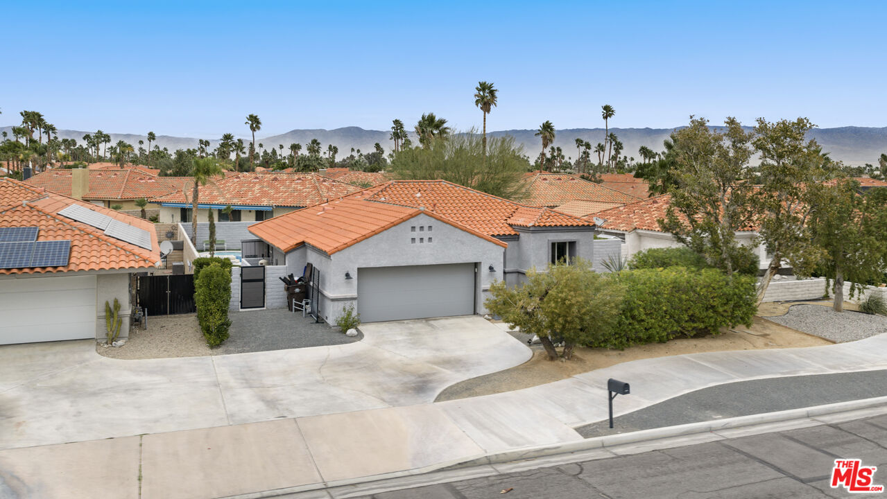 1450 East Racquet Club Road Palm Springs, CA 92262 - Photo 28 of 31 a view of a house with a outdoor space