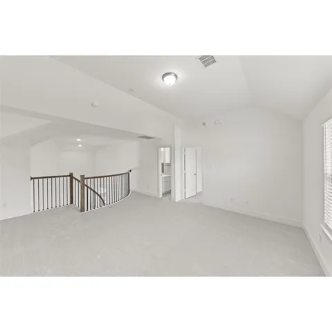 a kitchen with stainless steel appliances kitchen island granite countertop a sink and cabinets