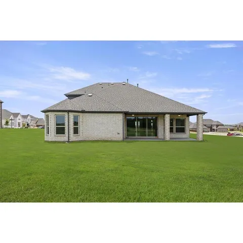 a house view with a outdoor space