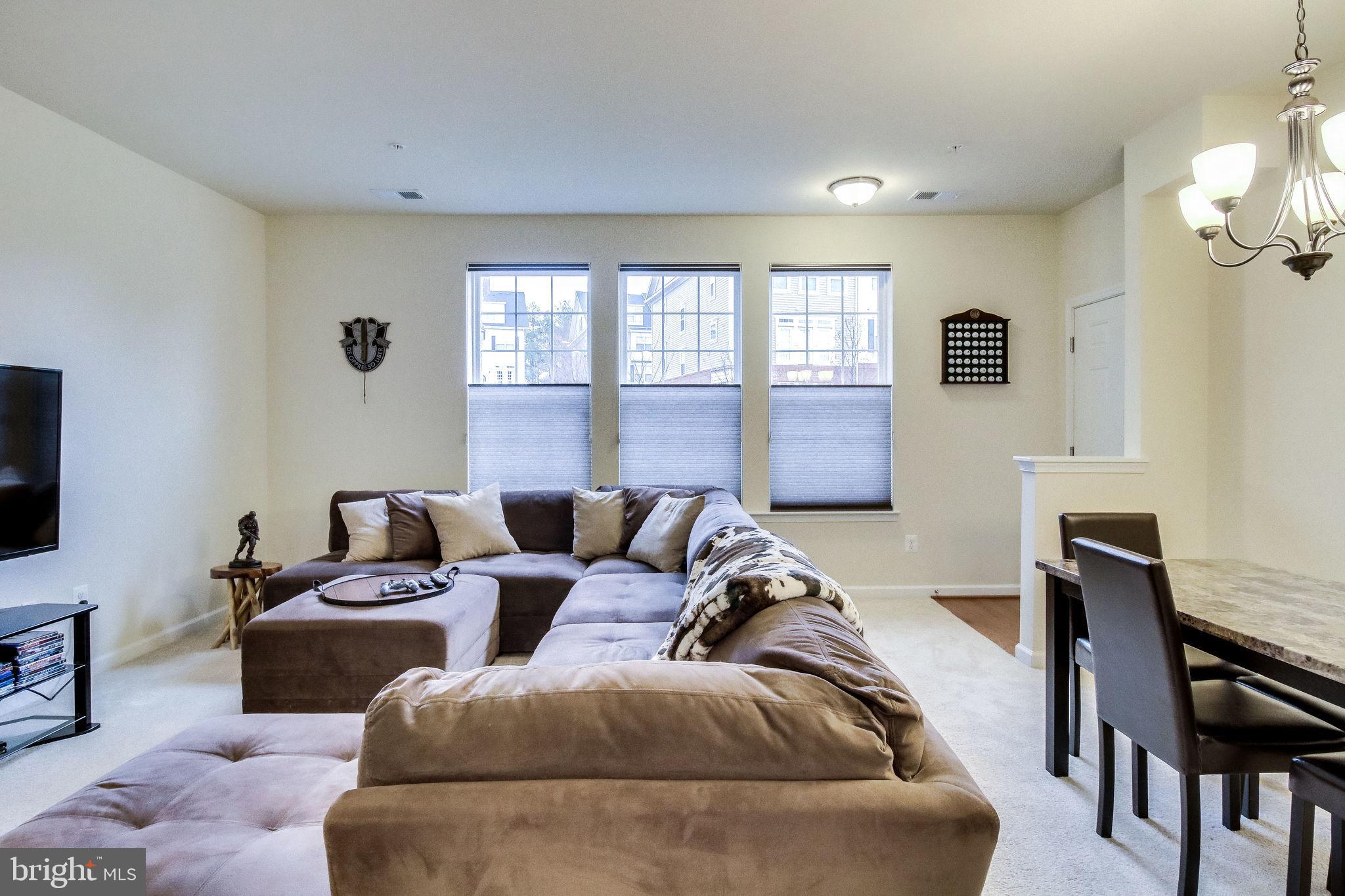 4847 Dane Ridge Circle, Unit 87 Woodbridge, VA 22193 - Photo 11 of 35 living space with natural light.