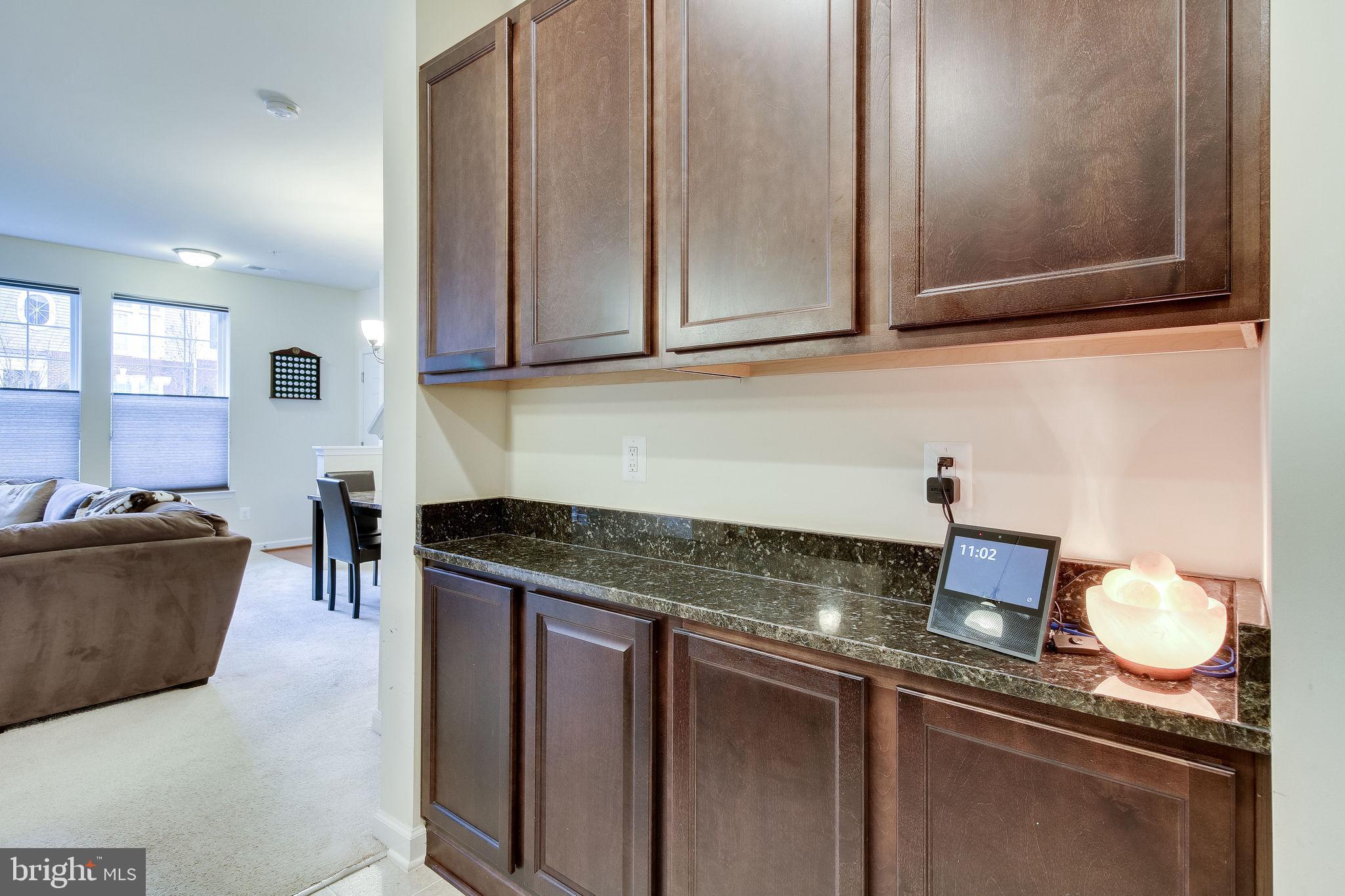 4847 Dane Ridge Circle, Unit 87 Woodbridge, VA 22193 - Photo 15 of 35 kitchen nook with sleek cabinetry.