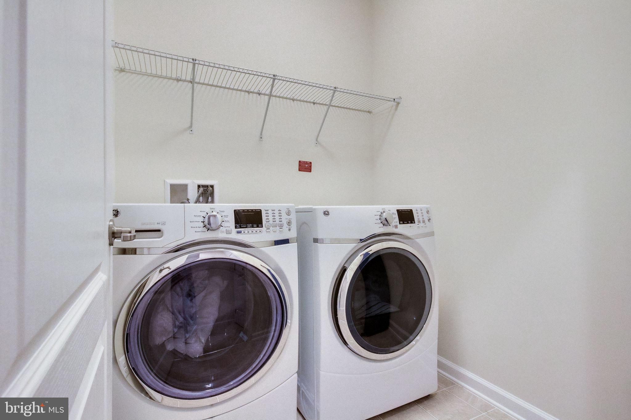 4847 Dane Ridge Circle, Unit 87 Woodbridge, VA 22193 - Photo 27 of 35 laundry space with sleek appliances.